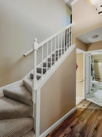 a view of livingroom with furniture and stairs