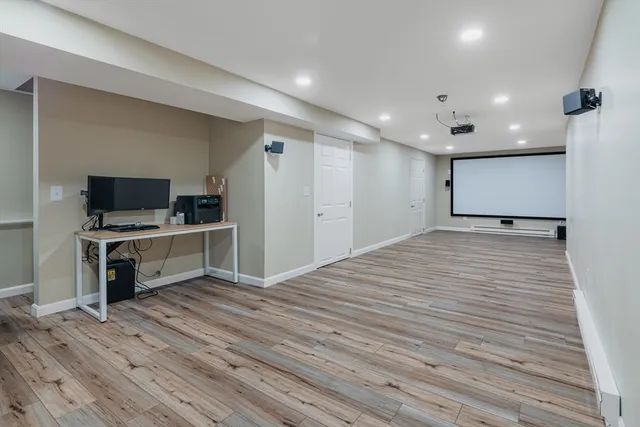 a view of kitchen with sink and microwave