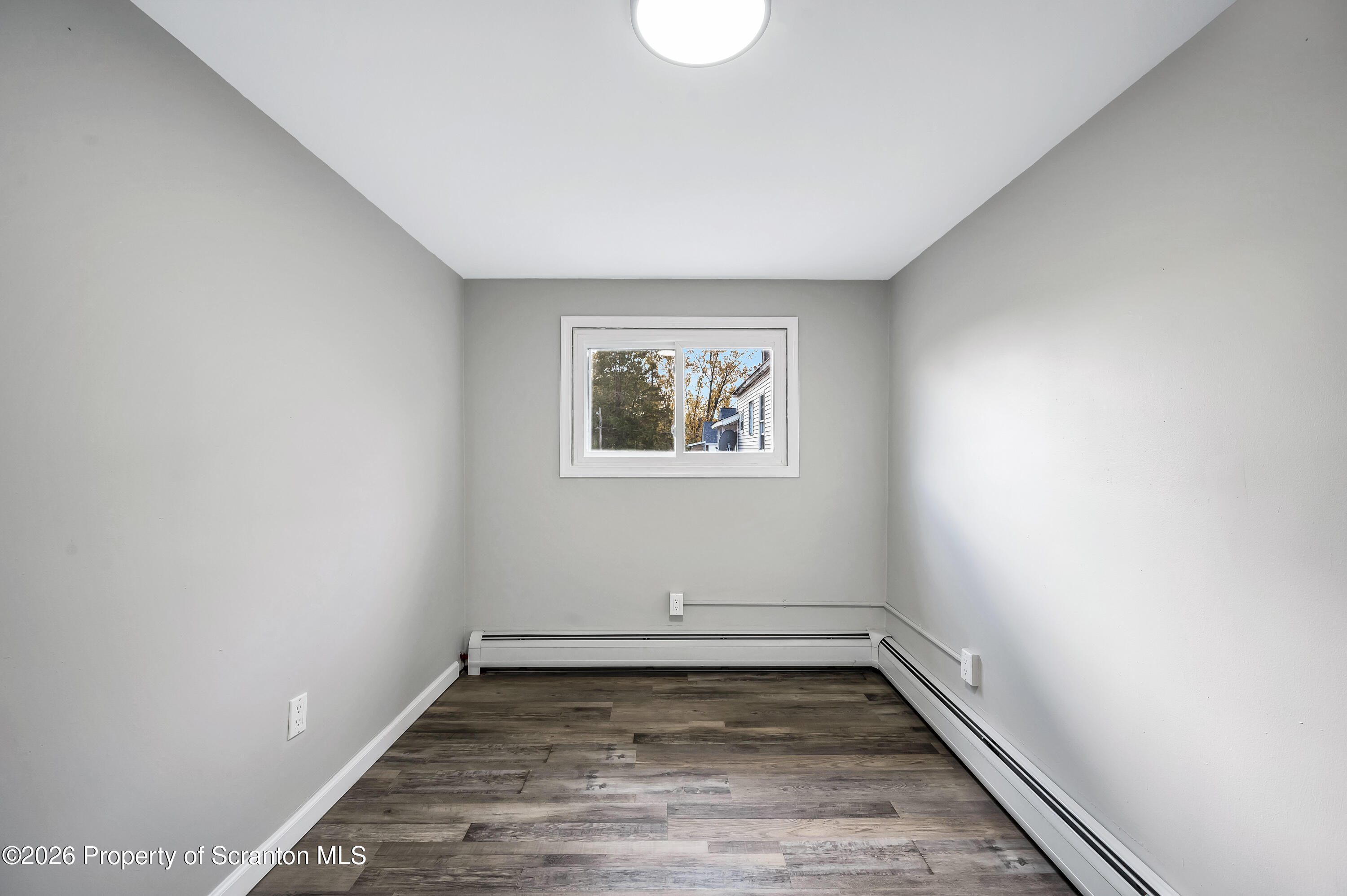 333 Oak Street, Unit 1/2 Scranton, PA 18508 - Photo 10 of 11 a view of a room with window and hardwood floor