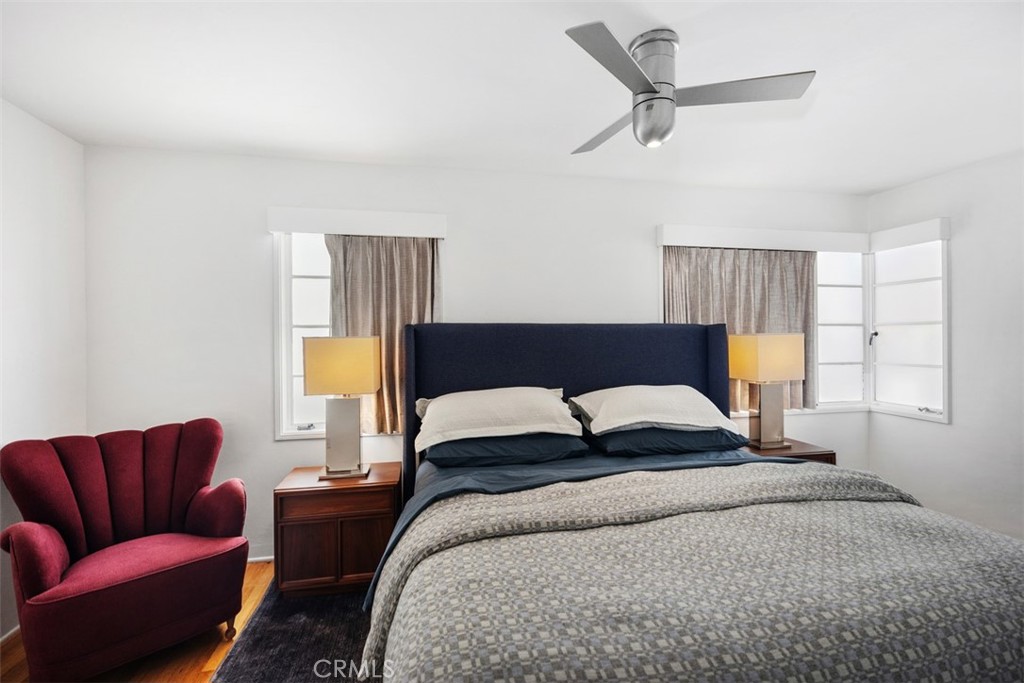 2142 Ruby Place Laguna Beach, CA 92651 - Photo 21 of 34 a bedroom with a bed couch and window