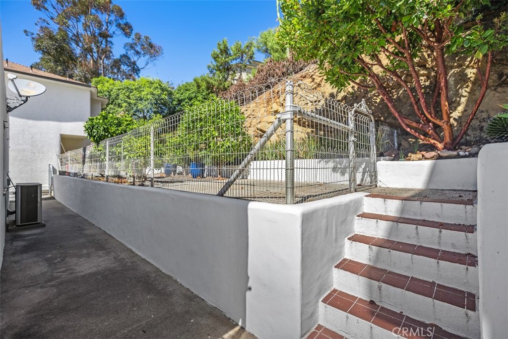 2142 Ruby Place Laguna Beach, CA 92651 - Photo 27 of 34 a view of balcony with a potted plant