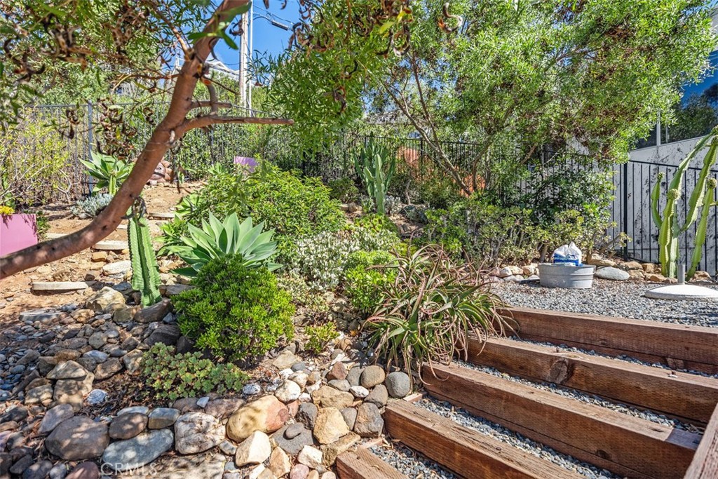 2142 Ruby Place Laguna Beach, CA 92651 - Photo 30 of 34 a view of a house with a yard and sitting area