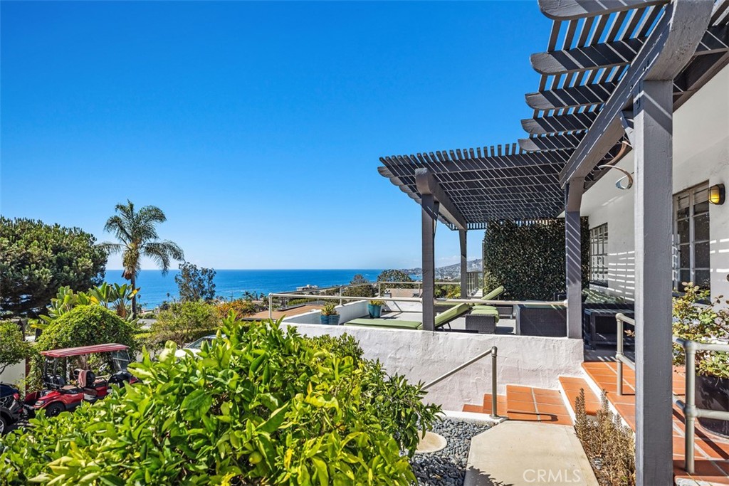 2142 Ruby Place Laguna Beach, CA 92651 - Photo 5 of 34 a view of a terrace with chairs and potted plants