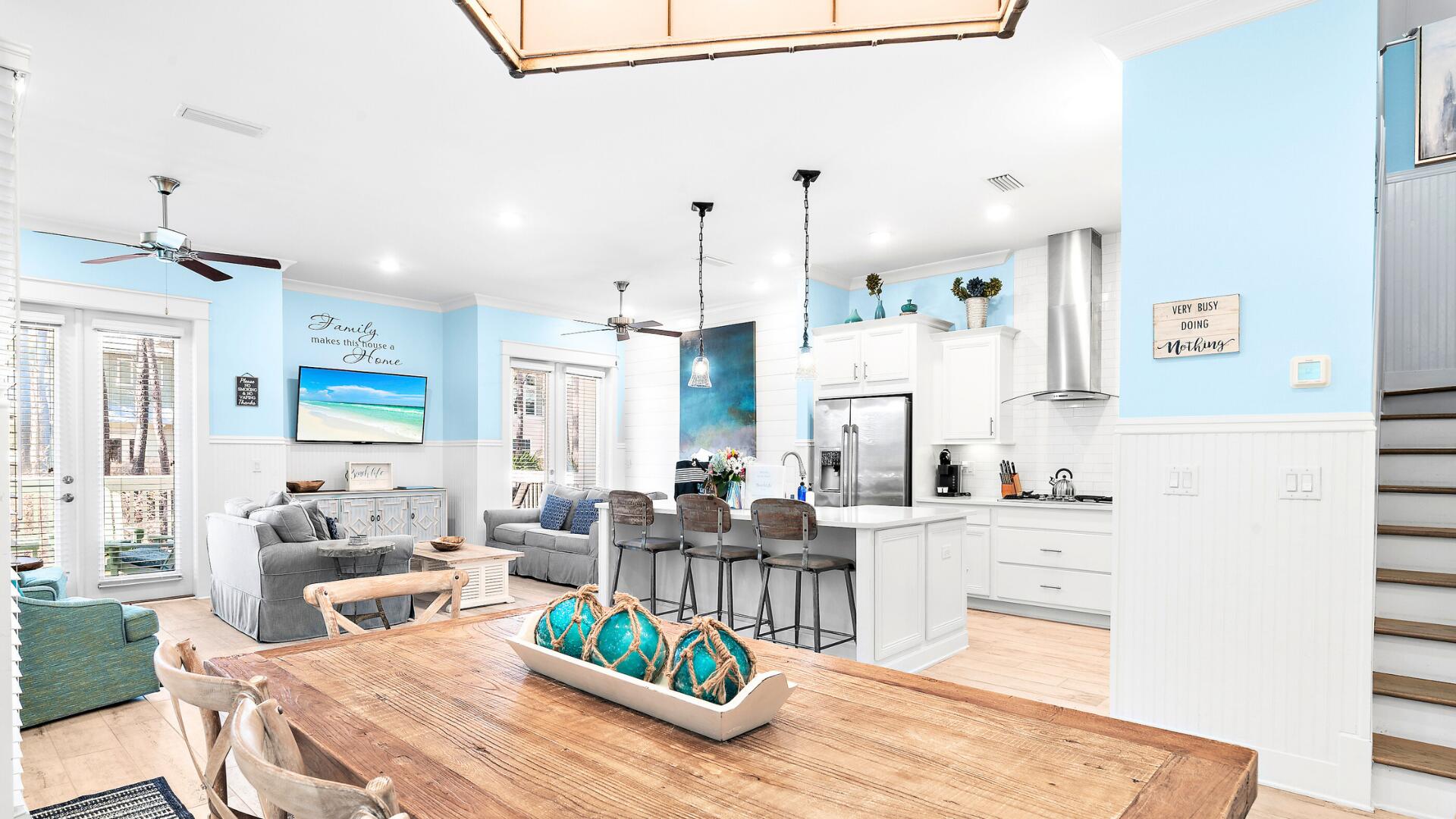 53 East E Pine, Unit A Inlet Beach, FL 32461 - Photo 13 of 59 a living room with fireplace furniture and a wooden floor