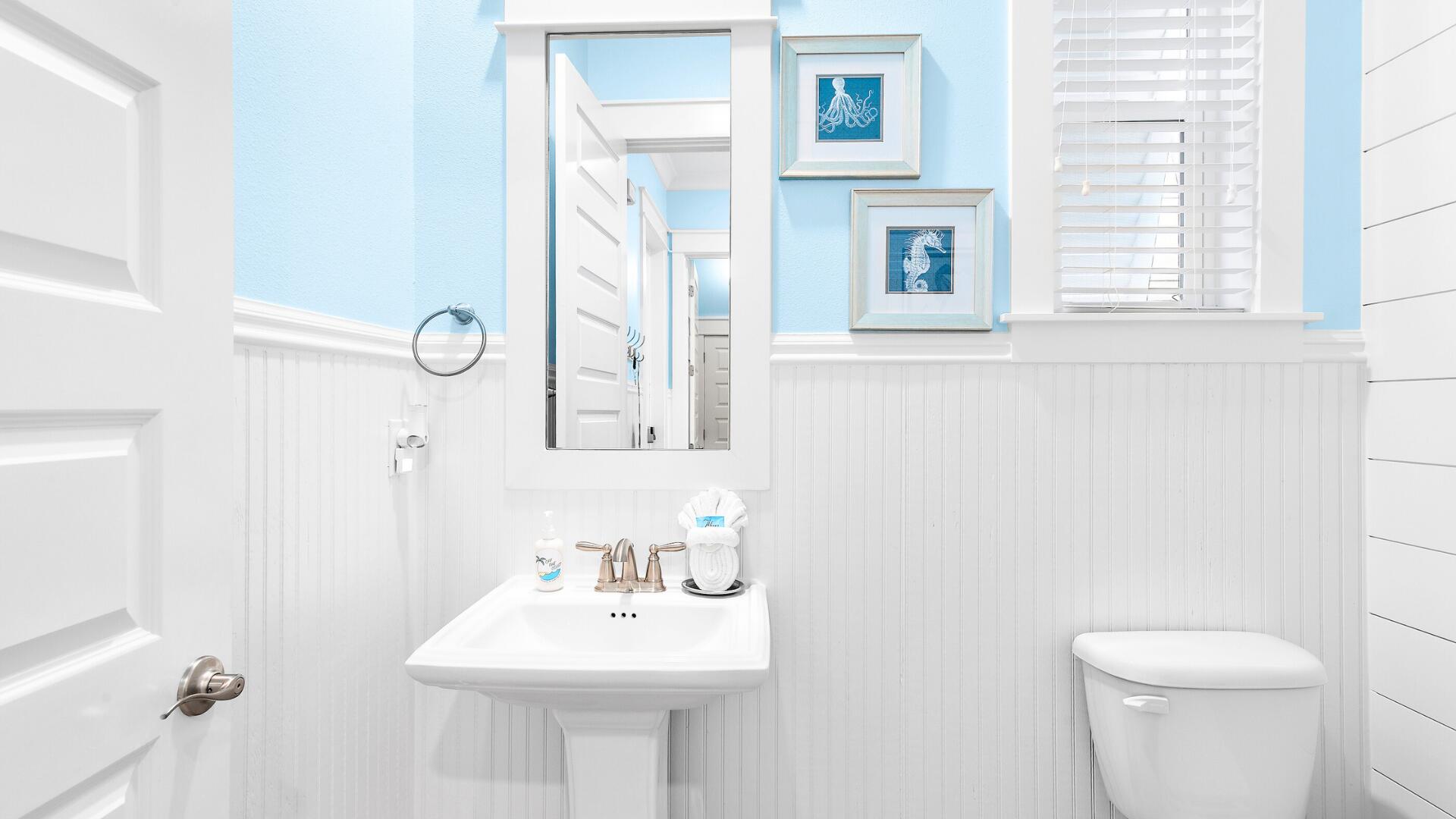 53 East E Pine, Unit A Inlet Beach, FL 32461 - Photo 15 of 59 a bathroom with a sink a toilet and a mirror