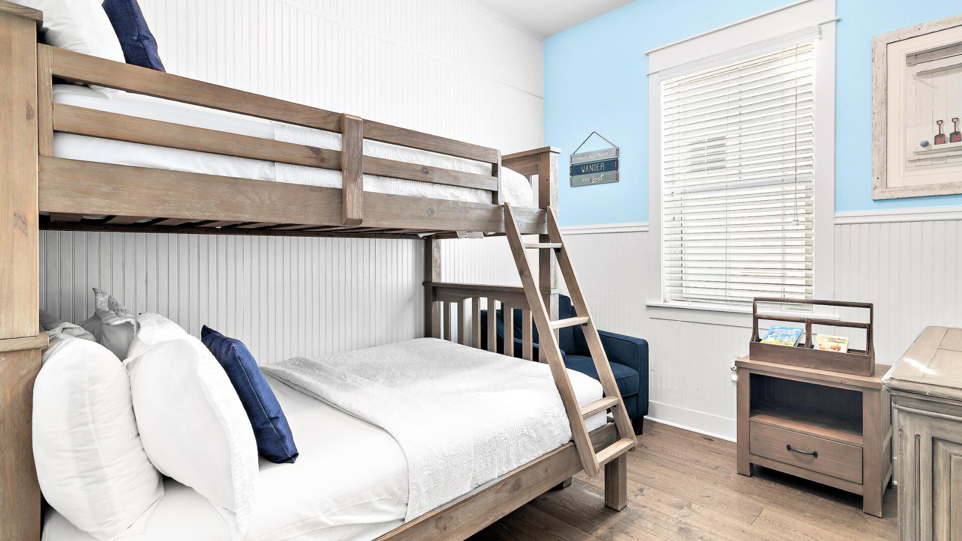 53 East E Pine, Unit A Inlet Beach, FL 32461 - Photo 22 of 59 a bedroom with a bed and a window