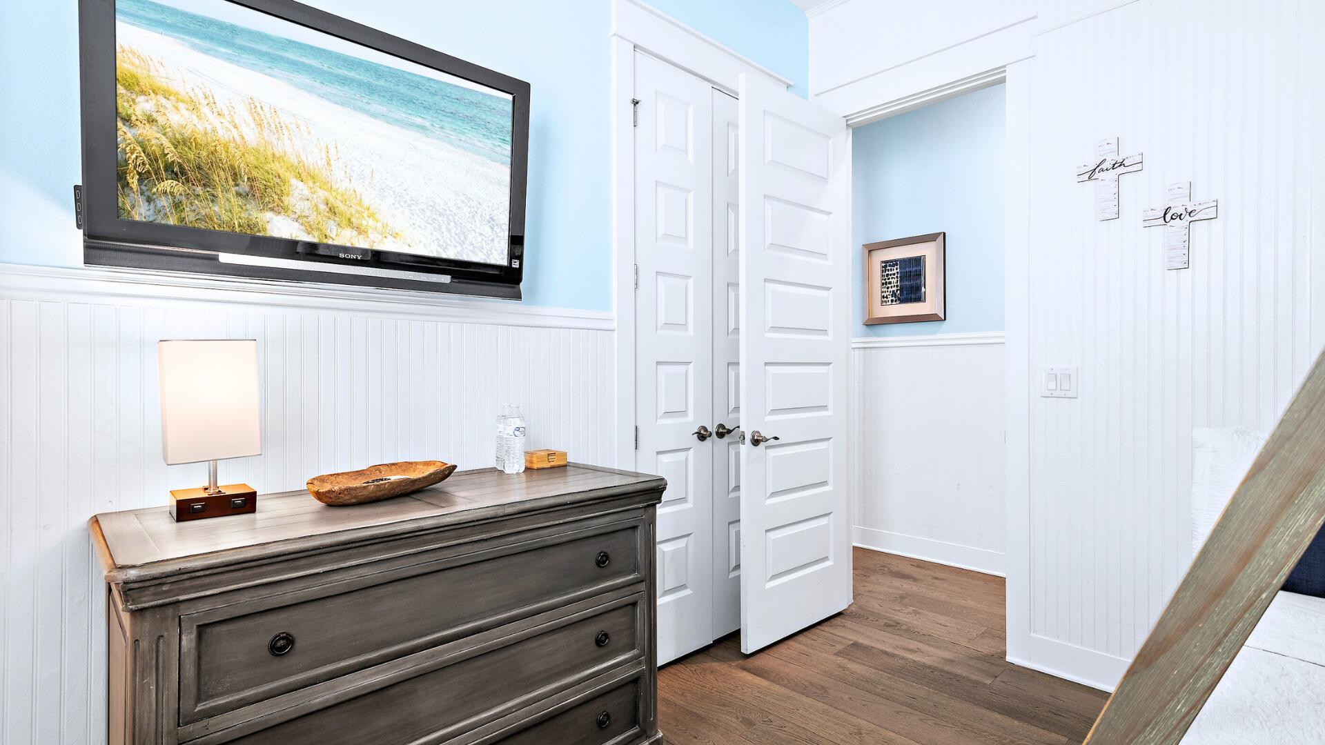 53 East E Pine, Unit A Inlet Beach, FL 32461 - Photo 25 of 59 a room with wooden floor and white wall