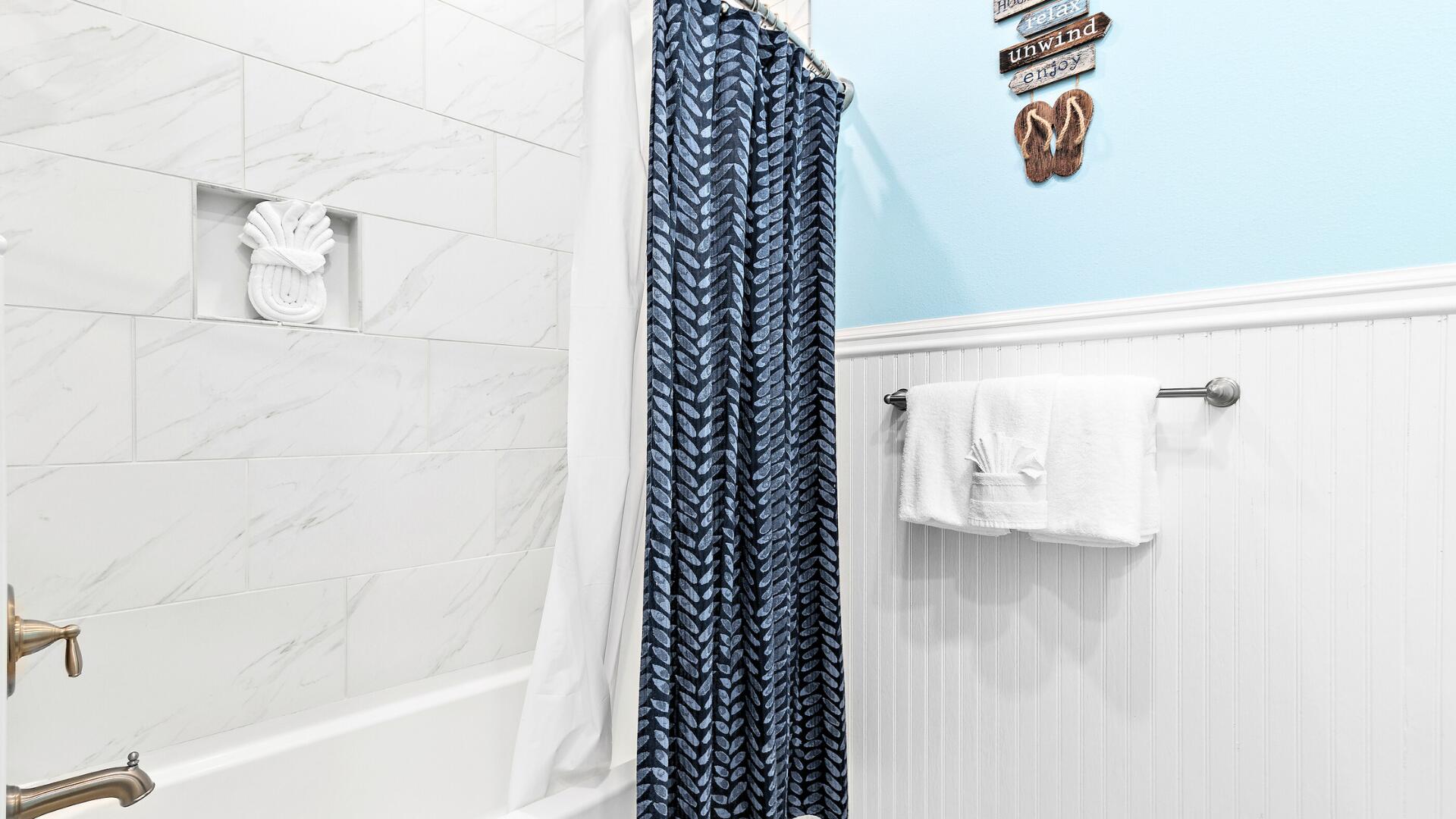 53 East E Pine, Unit A Inlet Beach, FL 32461 - Photo 27 of 59 a bathroom with a bathtub and shower