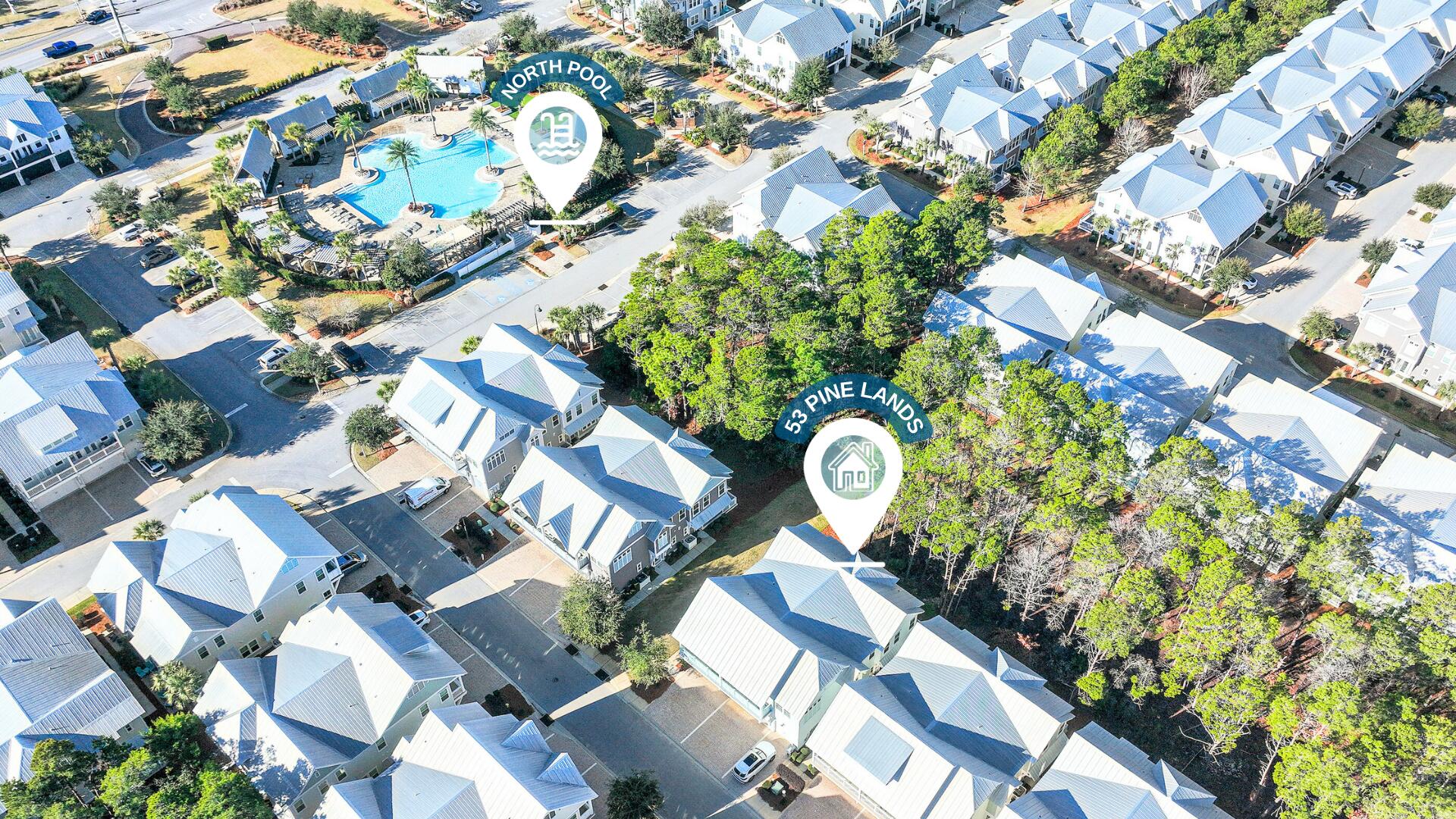 53 East E Pine, Unit A Inlet Beach, FL 32461 - Photo 33 of 59 an aerial view of a house with a yard basket ball court and outdoor seating