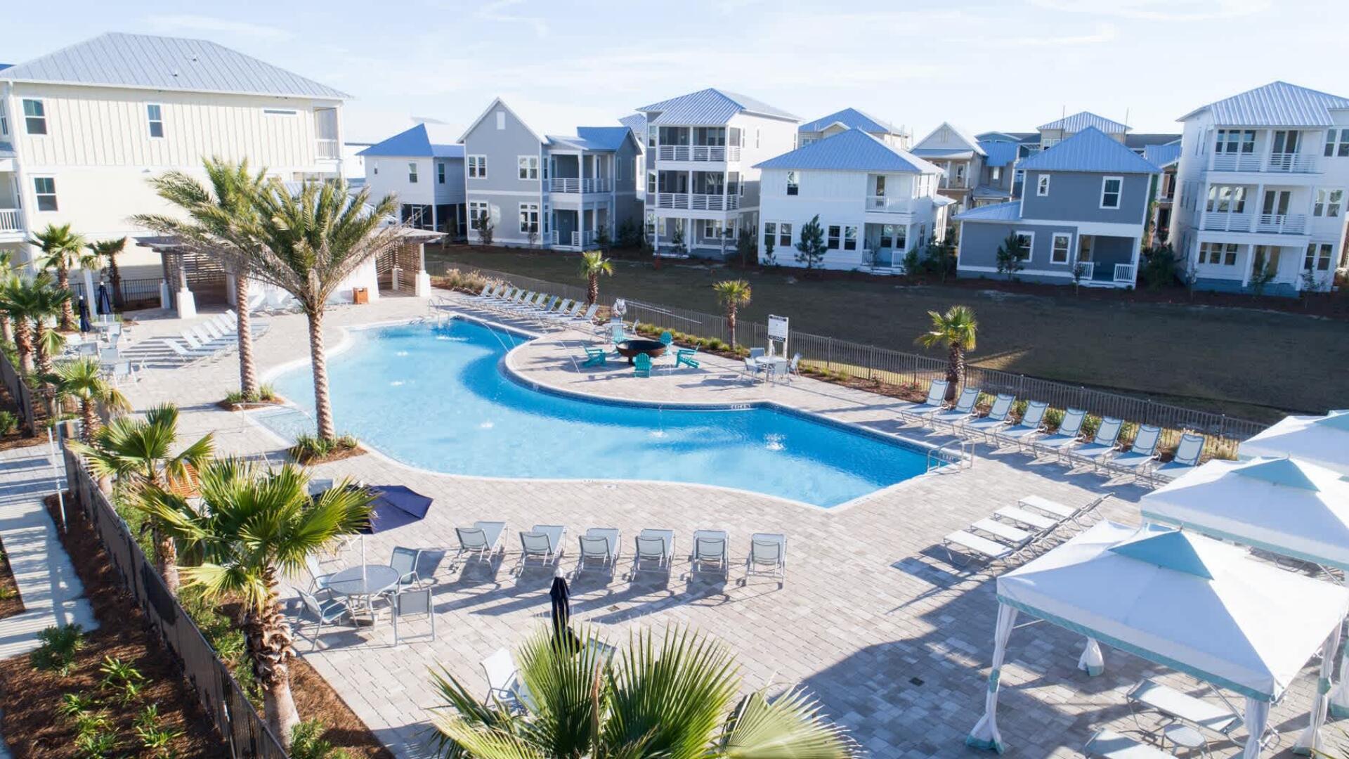 53 East E Pine, Unit A Inlet Beach, FL 32461 - Photo 40 of 59 a view of a house with swimming pool and sitting area