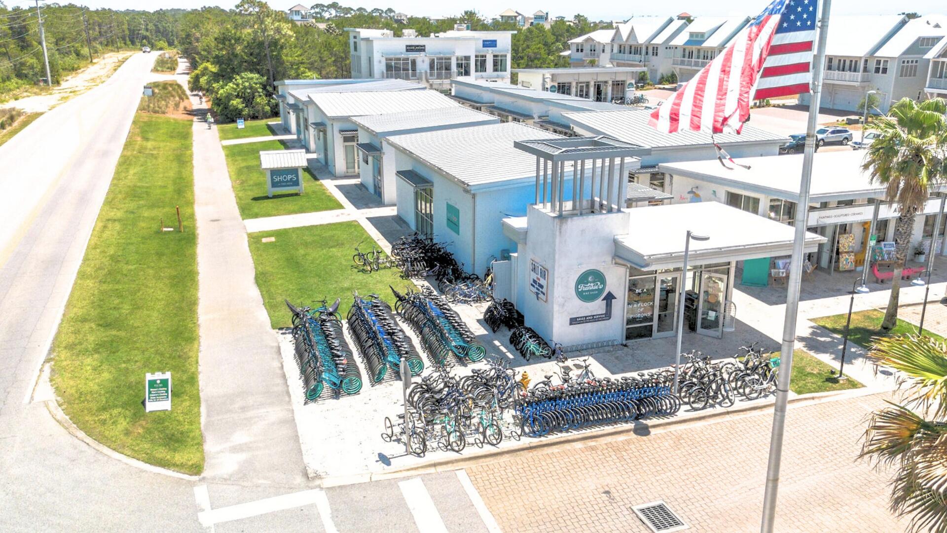 53 East E Pine, Unit A Inlet Beach, FL 32461 - Photo 46 of 59 a view of a swimming pool with a patio and a lake view