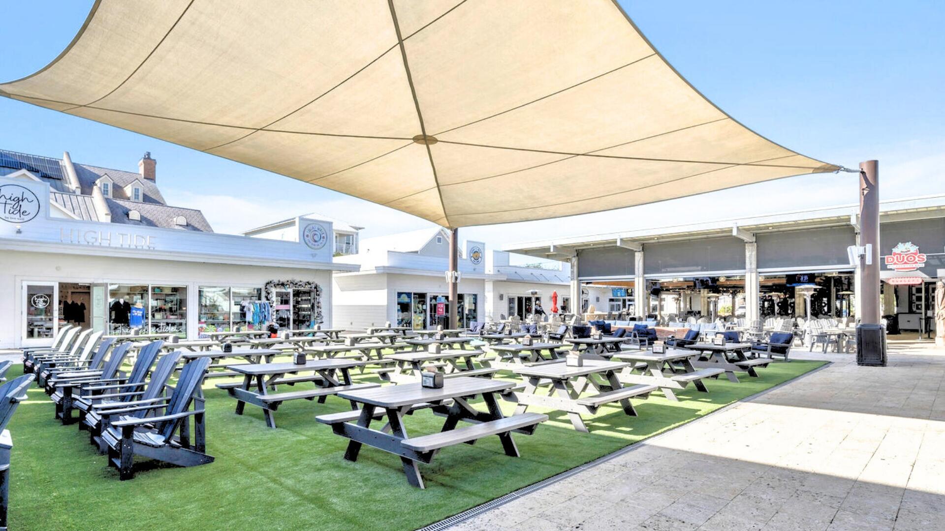 53 East E Pine, Unit A Inlet Beach, FL 32461 - Photo 50 of 59 a room with lots of table and chairs