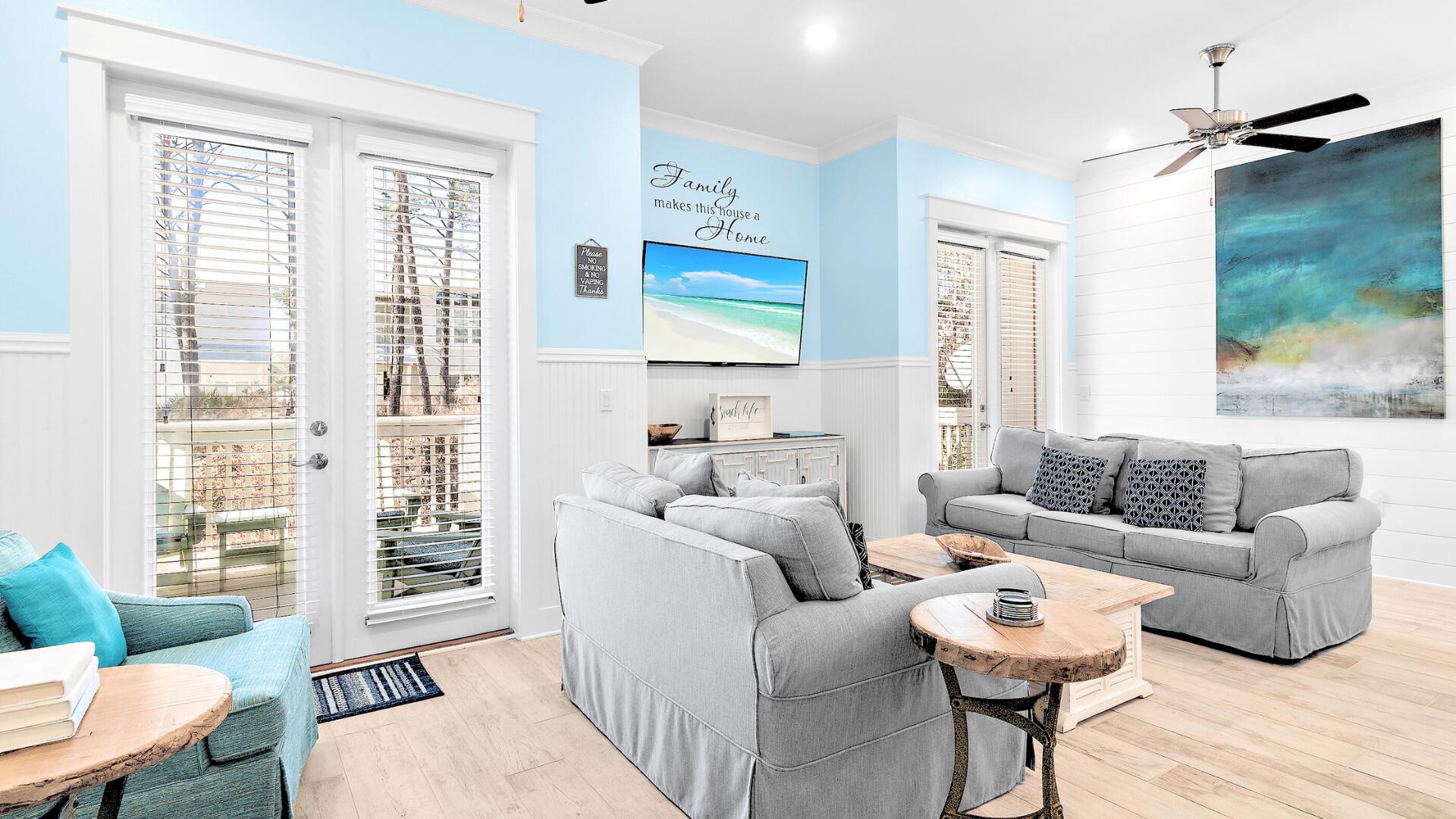 53 East E Pine, Unit A Inlet Beach, FL 32461 - Photo 5 of 59 a living room with furniture a large window and wooden floor