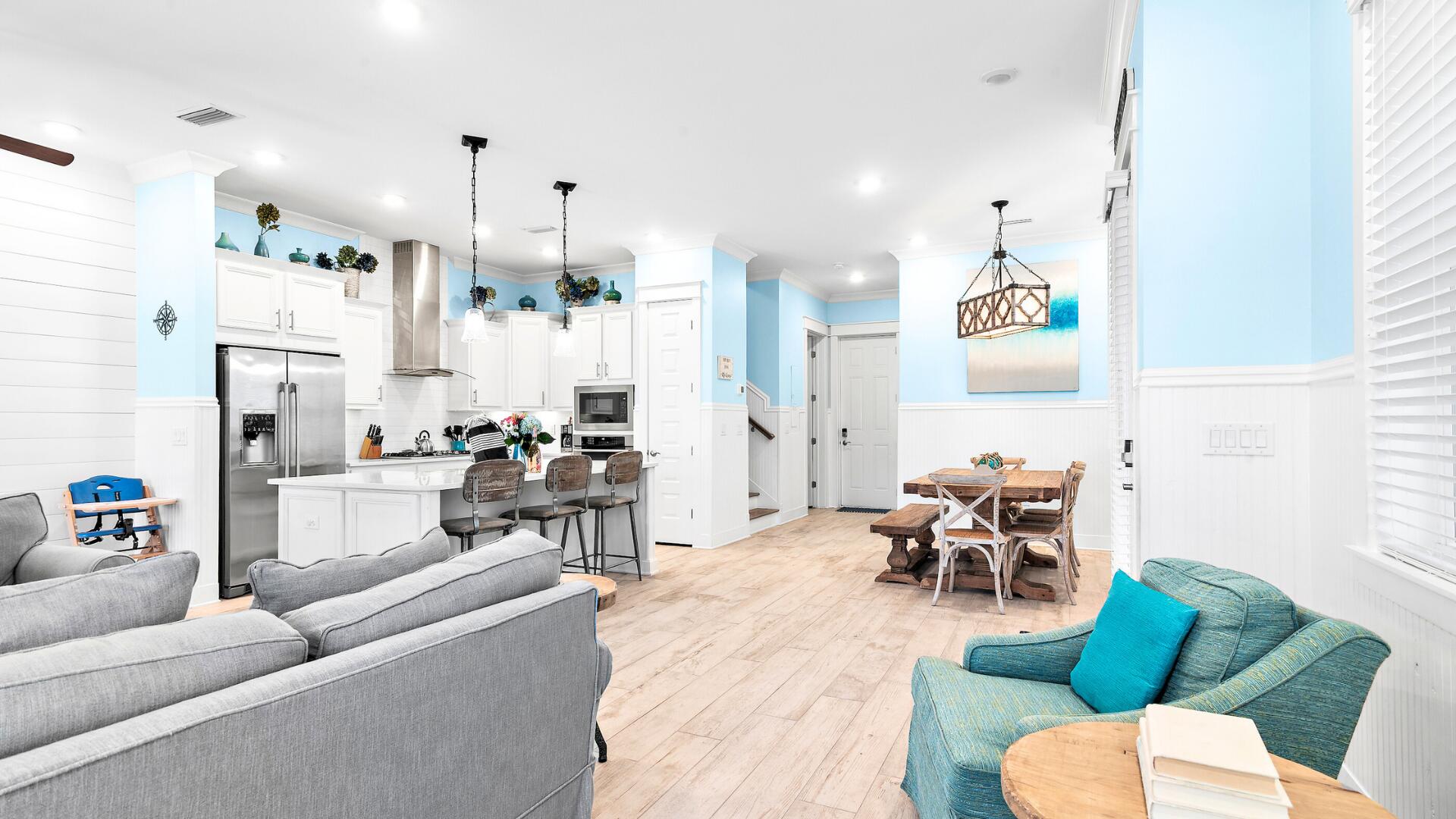 53 East E Pine, Unit A Inlet Beach, FL 32461 - Photo 7 of 59 a living room with furniture kitchen view and a chandelier