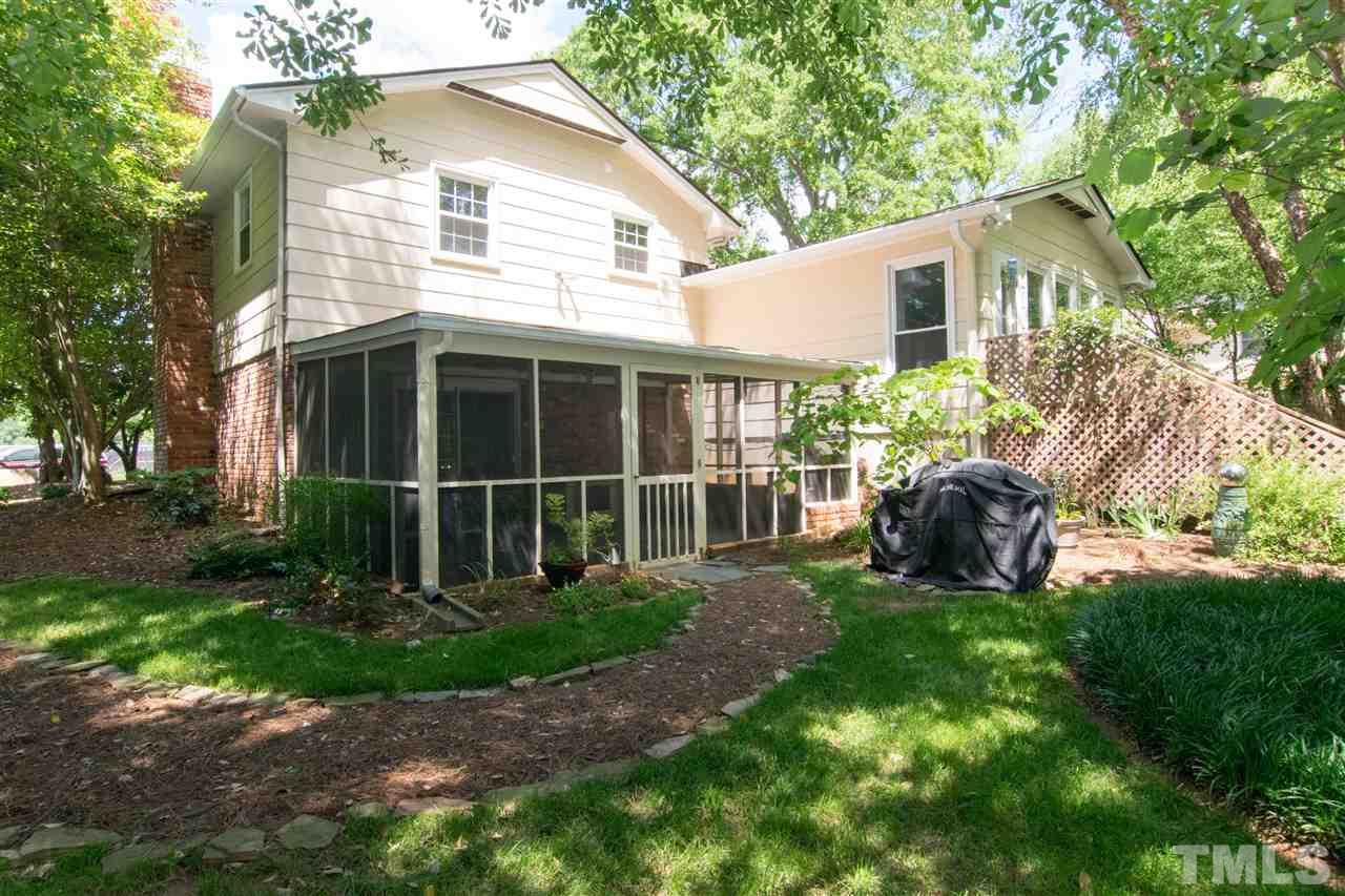 4708 Rampart Street Raleigh, NC 27609 - Photo 25 of 25 a view of a house with backyard and sitting area