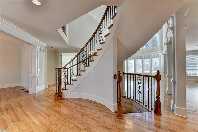 a bathroom with a toilet a sink and a mirror