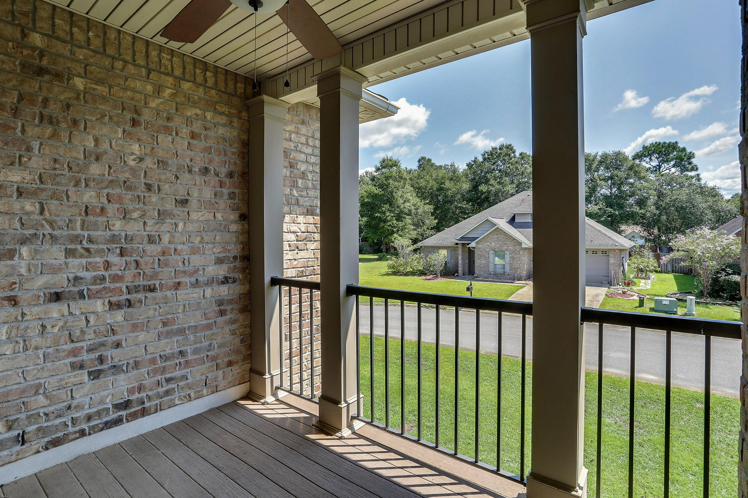 4581 Hermosa Road Crestview, FL 32539 - Photo 41 of 60 a view of a balcony with wooden floor