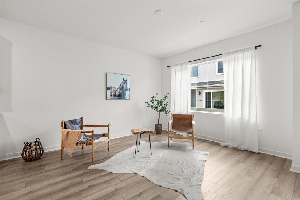 319 Minneola Place Fallbrook, CA 92028 - Photo 5 of 19 a living room with furniture and wooden floor