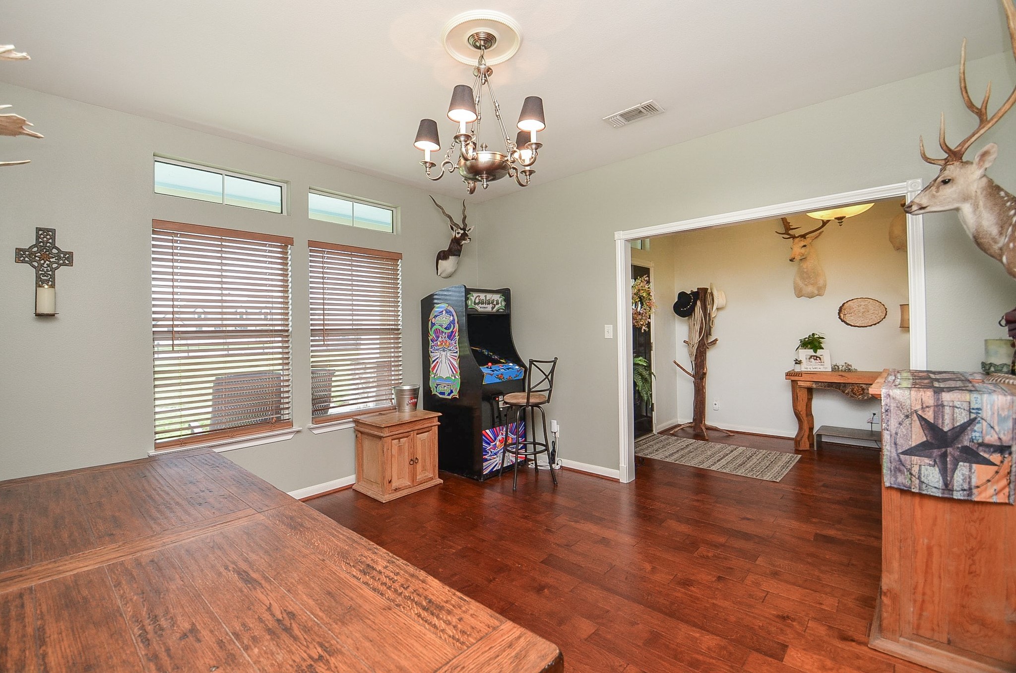 27644 Spring Hill Road Hempstead, TX 77445 - Photo 7 of 50 This wide open area can easily become a dining place, right off the main entrance hallway; with dual windows for natural light, high ceiling and gorgeous wood flooring.