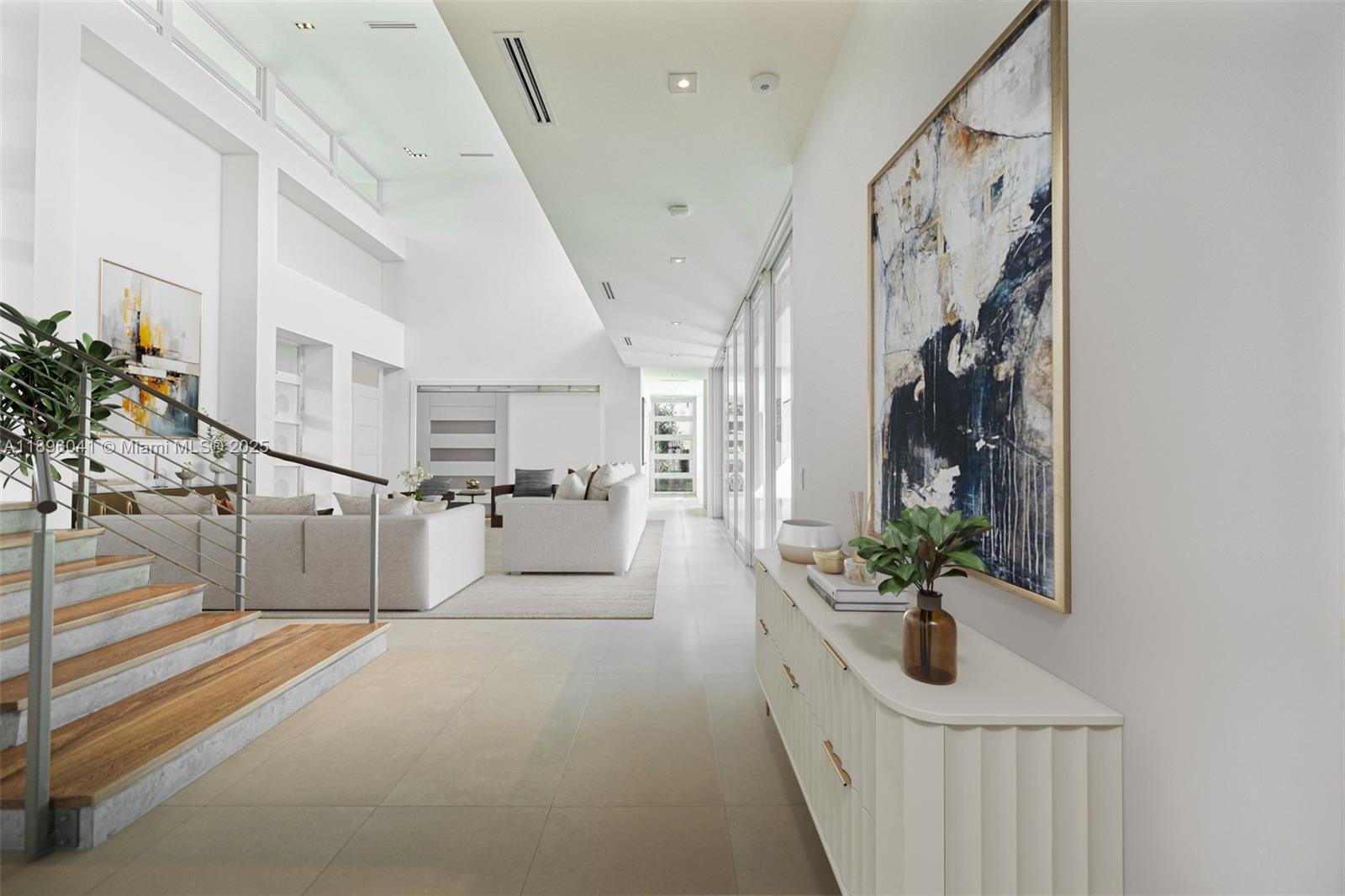 6080 Southwest 88th Street Pinecrest, FL 33156 - Photo 5 of 29 a view of entryway and hall with wooden floor