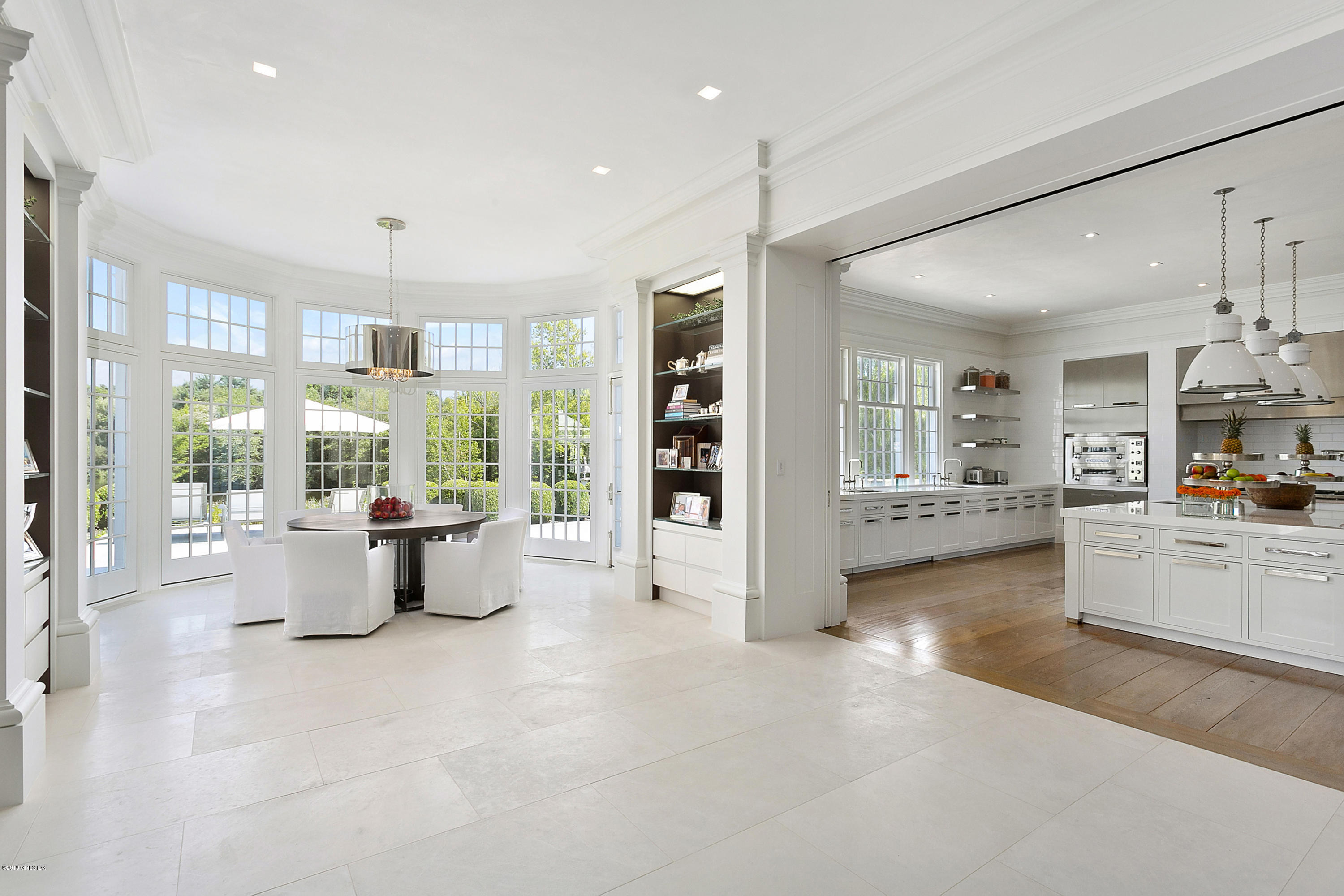 Undisclosed Address Greenwich, CT 06831 - Photo 11 of 23 a living room with furniture and large large window with kitchen view