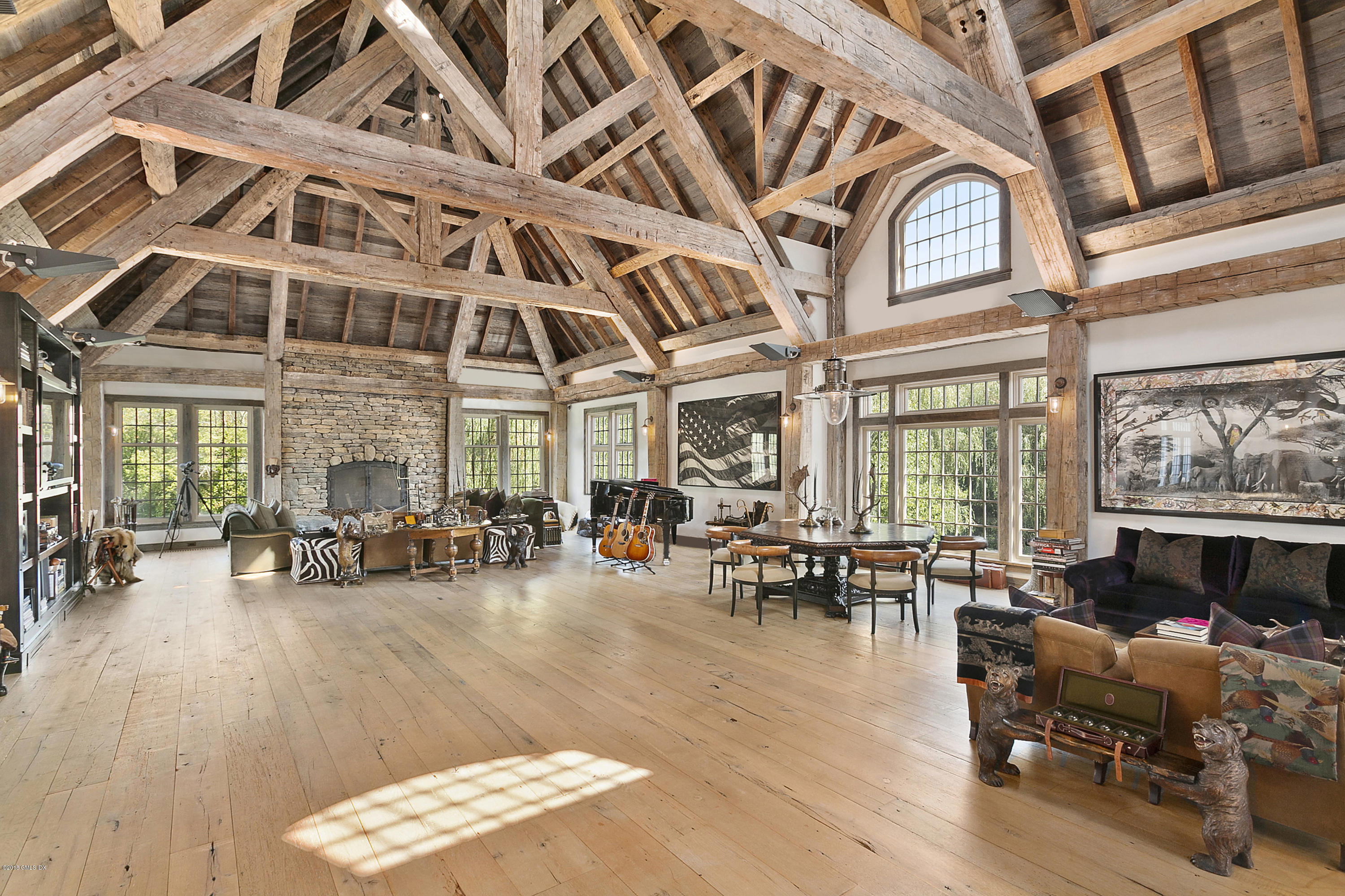 Undisclosed Address Greenwich, CT 06831 - Photo 14 of 23 a living room with furniture a fireplace and large windows