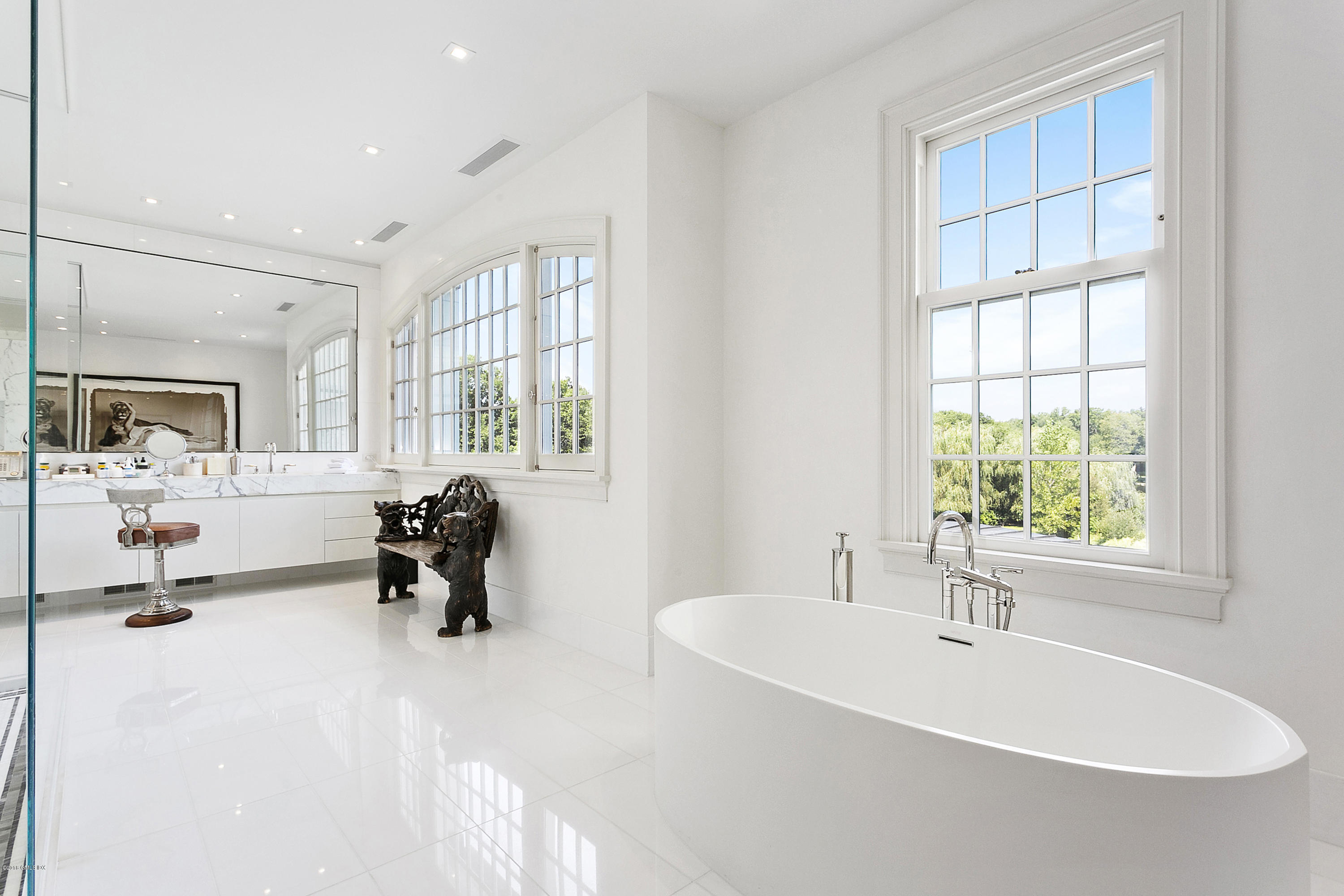 Undisclosed Address Greenwich, CT 06831 - Photo 19 of 23 a view of a room with gym equipment and a window