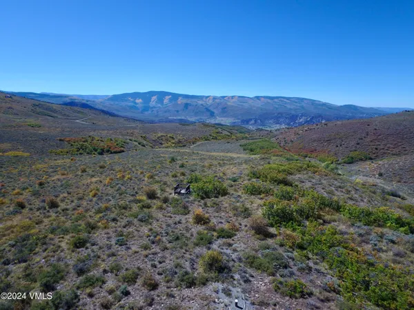 a view of mountain and a mountain