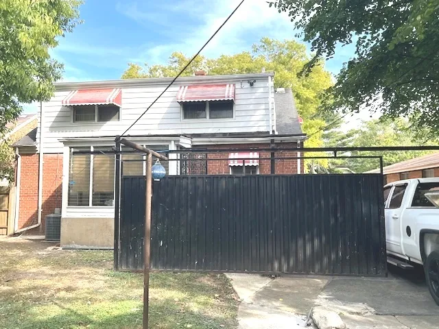 a view of a door and a window