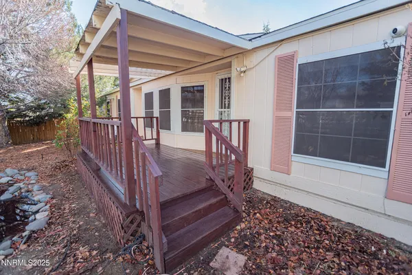 a view of balcony with a potted plant
