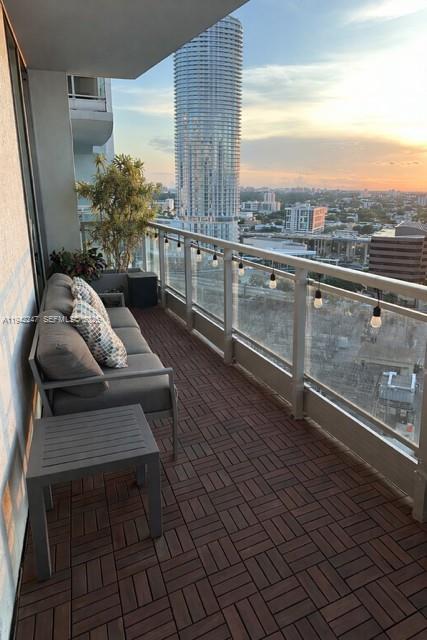 90 Southwest 3rd Street, Unit 2306 Miami, FL 33130 - Photo 19 of 29 a view of a balcony with furniture