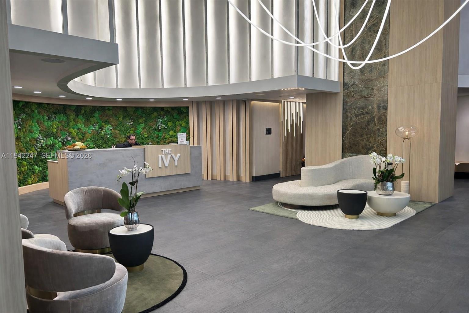 90 Southwest 3rd Street, Unit 2306 Miami, FL 33130 - Photo 23 of 29 a living room with furniture and a fireplace