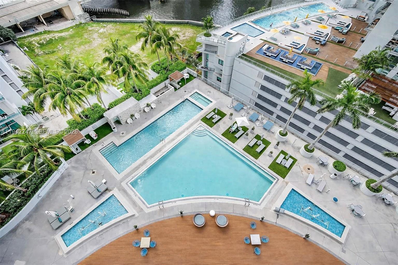 90 Southwest 3rd Street, Unit 2306 Miami, FL 33130 - Photo 24 of 29 an aerial view of a house with a yard