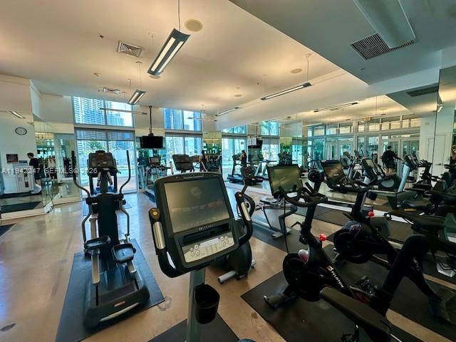 90 Southwest 3rd Street, Unit 2306 Miami, FL 33130 - Photo 26 of 29 a view of a room with gym equipment