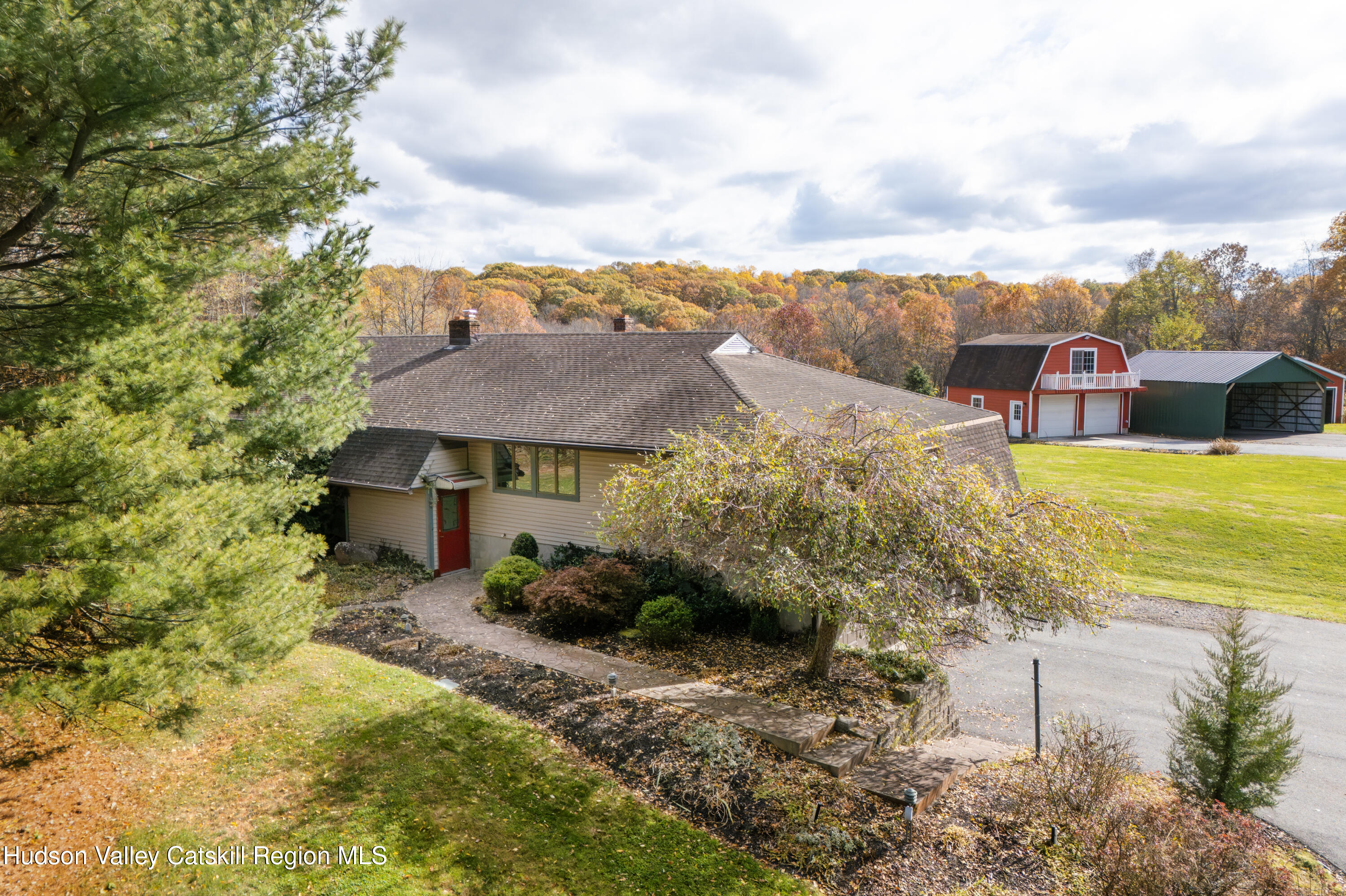 370 Forest Road Wallkill, NY 12589 - Photo 27 of 33 a view of a house with a yard and sitting area