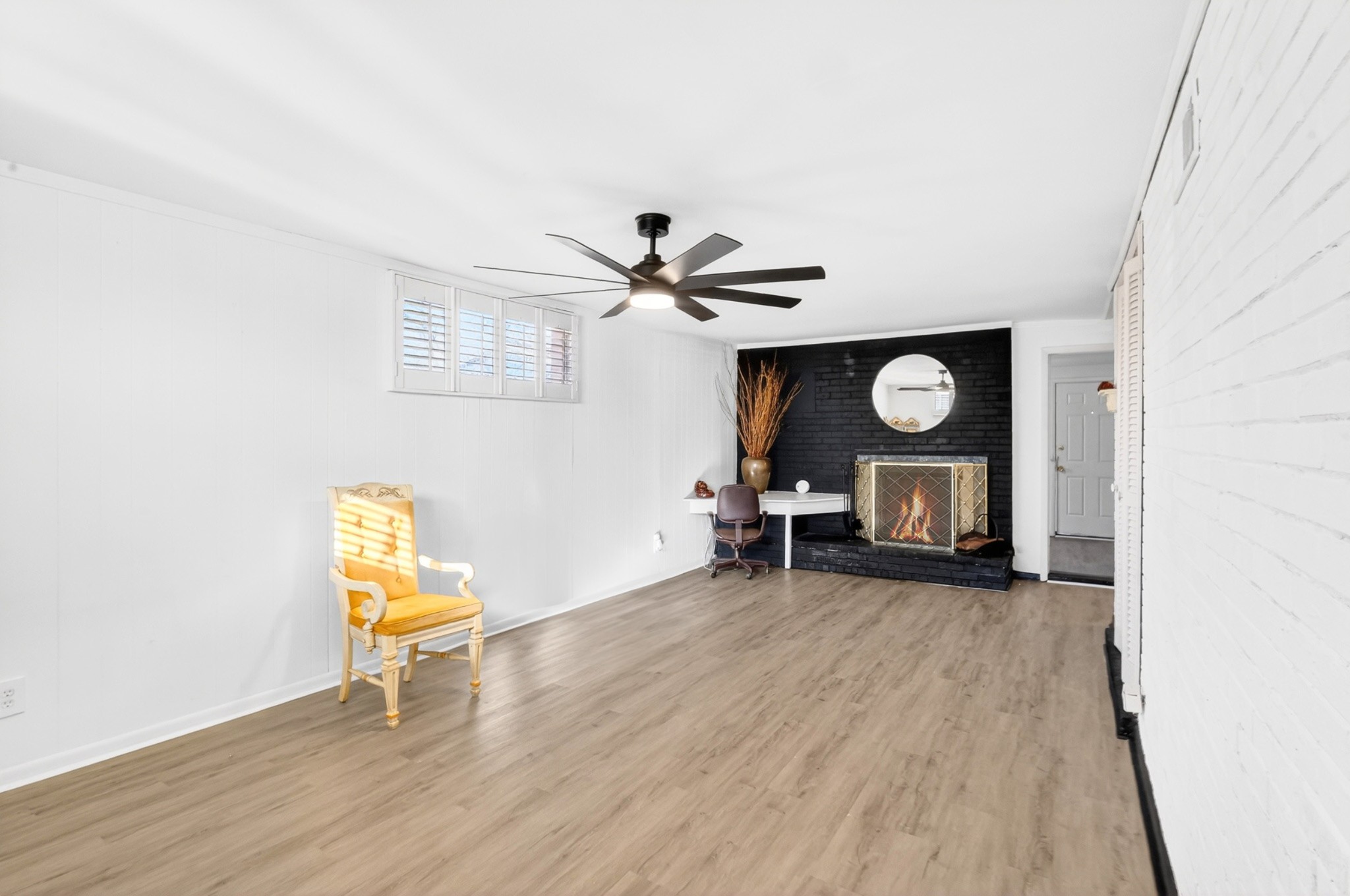 758 Moormans Arm Road Nashville, TN 37207 - Photo 12 of 35 a view of a livingroom with wooden floor and a ceiling fan