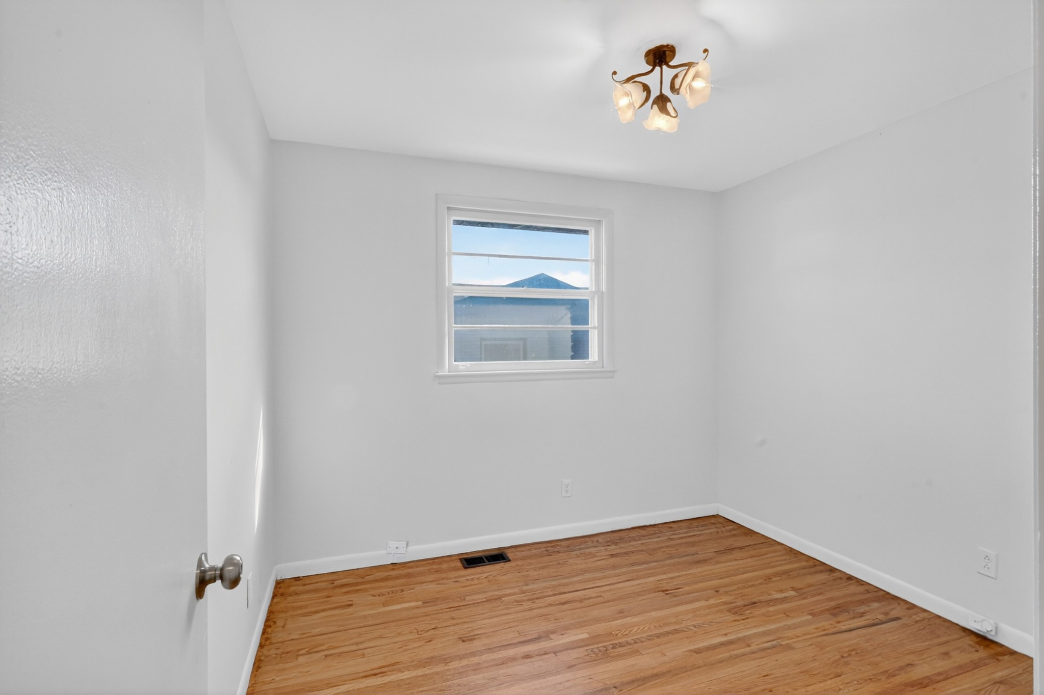 758 Moormans Arm Road Nashville, TN 37207 - Photo 17 of 35 wooden floor in an empty room with a window