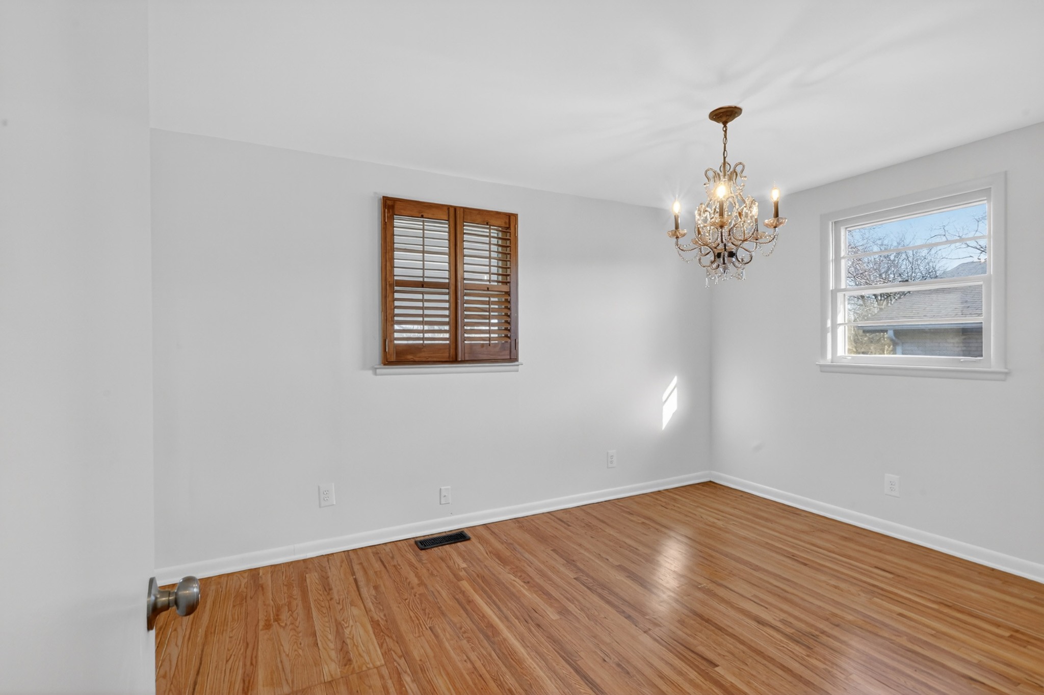 758 Moormans Arm Road Nashville, TN 37207 - Photo 27 of 35 a view of an empty room with wooden floor and a window