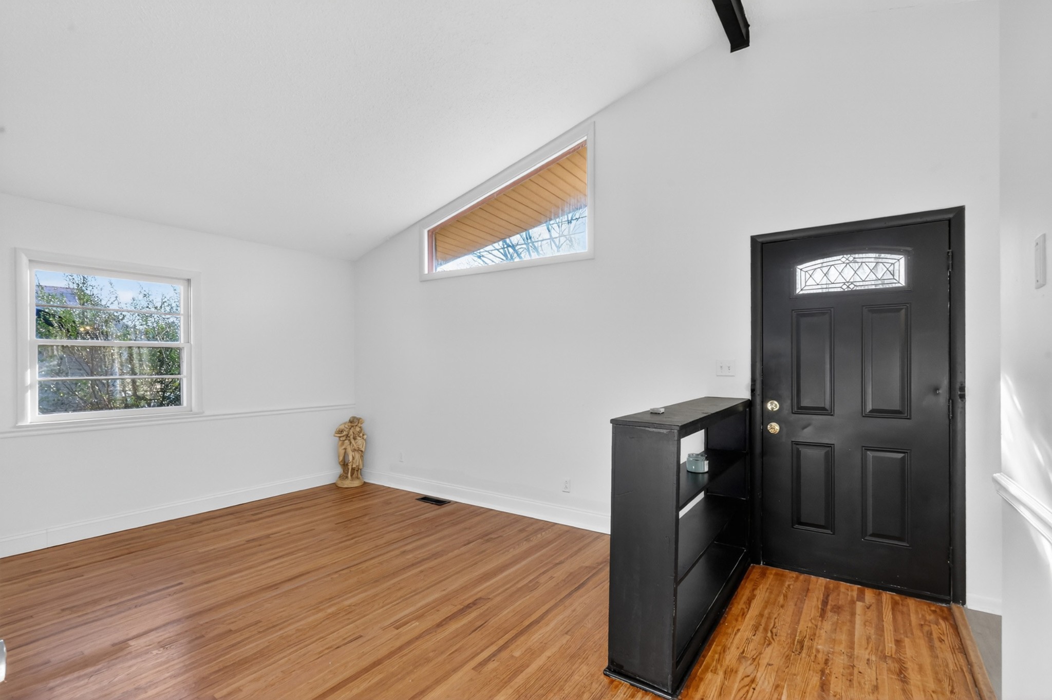 758 Moormans Arm Road Nashville, TN 37207 - Photo 5 of 35 a view of a livingroom with wooden floor and a window
