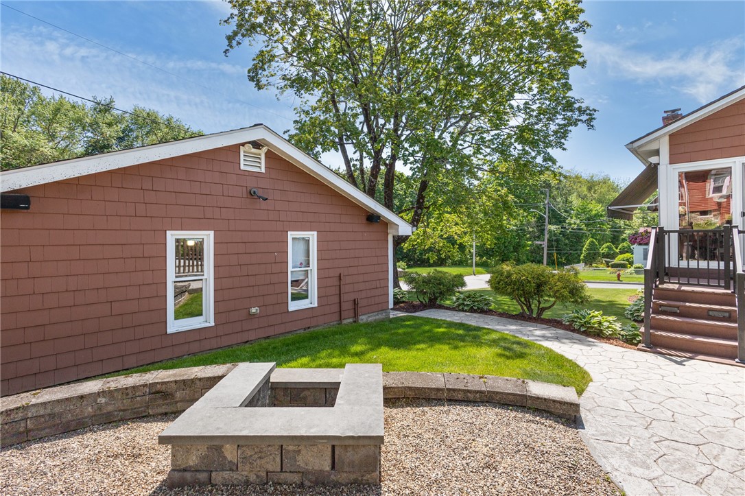 11 Bourassa Avenue Woonsocket, RI 02895 - Photo 35 of 39 Firepit and yard