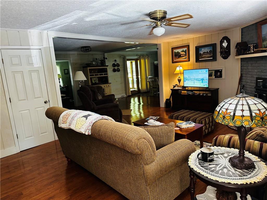 368 Dixon Road Demorest, GA 30535 - Photo 25 of 67 a living room with furniture and a fireplace