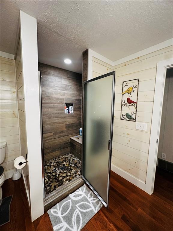 368 Dixon Road Demorest, GA 30535 - Photo 44 of 67 a bathroom with a glass shower door