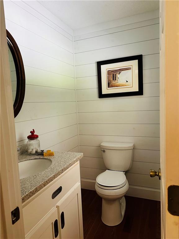 368 Dixon Road Demorest, GA 30535 - Photo 54 of 67 a bathroom with a granite countertop toilet and a sink