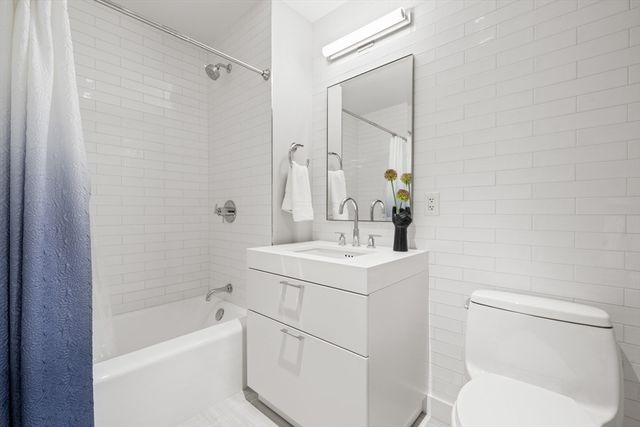 a room with cabinets and window