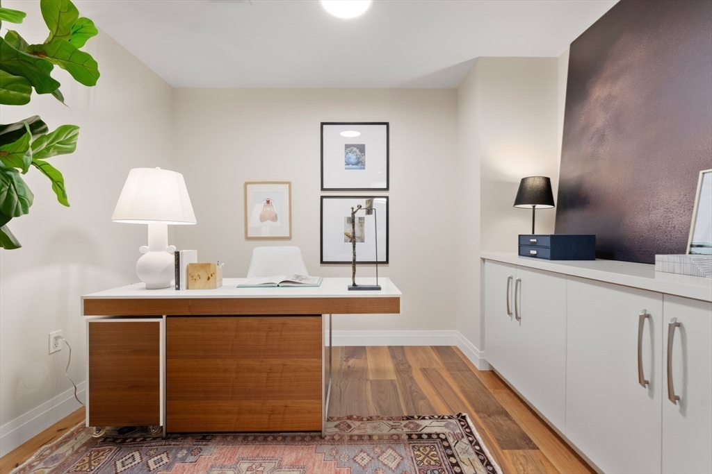 300 Pier 4 Blvd., Unit 7G Boston, MA 02210 - Photo 26 of 39 a room with cabinets and window