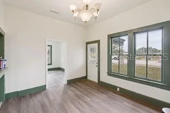 a view of livingroom with hardwood floor and window