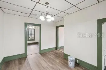 a view of a room with a wooden floor