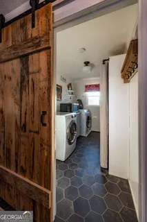 a utility room with cabinets