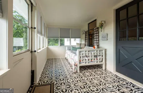 a living room with furniture and a table