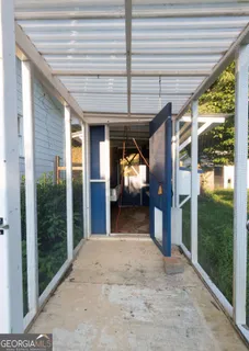 a house view with a garden space